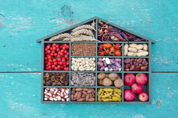 Vegetarian healthy fruits, seeds and dried food ingredient in wooden box