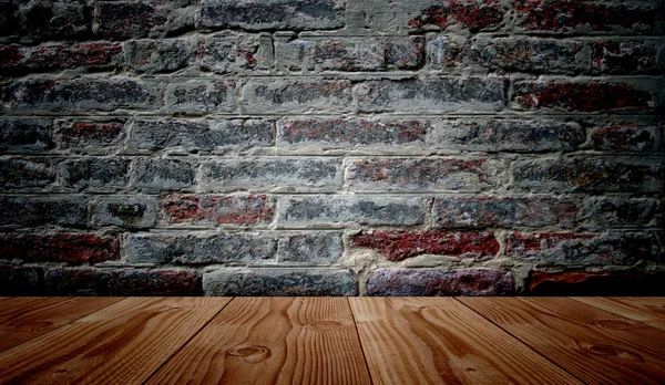 Floor and brick wall