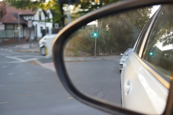 Wing mirror images through moving vehicle