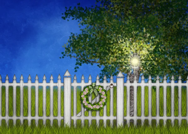 White fence and gate with wreath