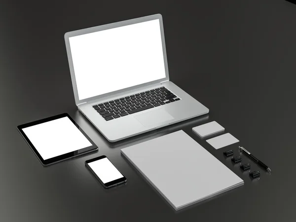 Mockup business template. Set of elements on the black table.