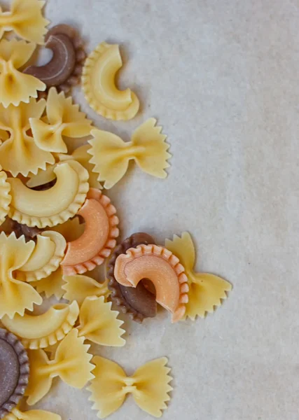 Multicolored different shapes of uncooked pasta