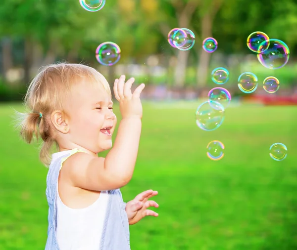 Happy child playing outdoors