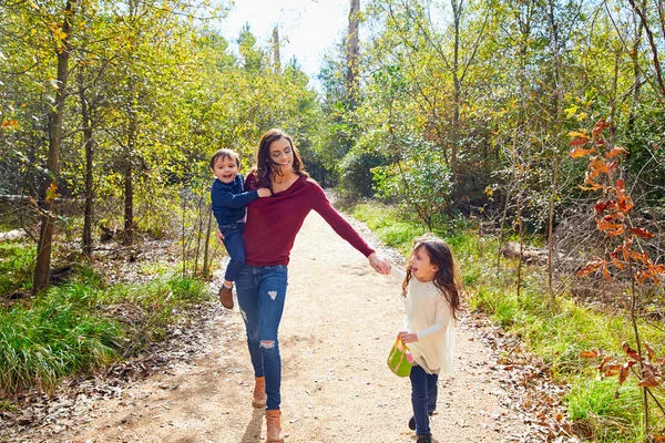 Mother daughter and son family in the park