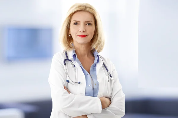 Female doctor with a stethoscope around her neck