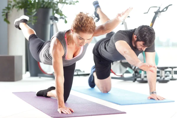 Man and woman training together