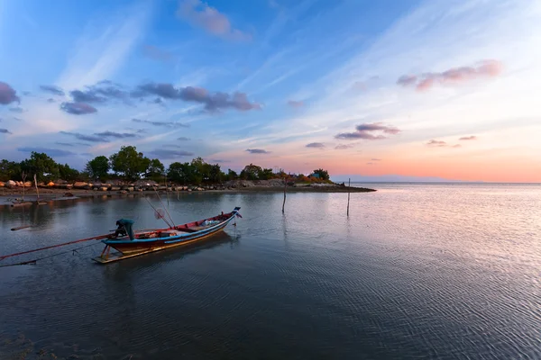 Fishing boat at sunset