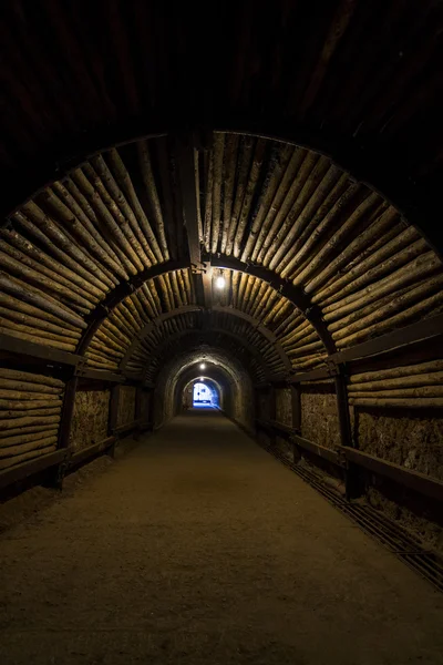 Dark eerie mining tunnel