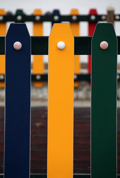 Colorful painted playground fence