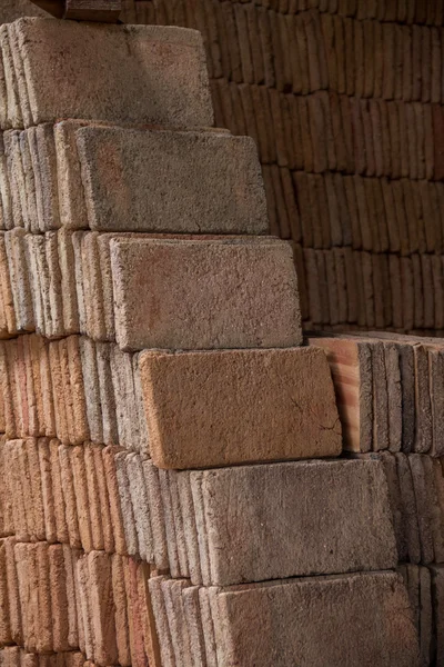 Pile of traditional mud bricks production