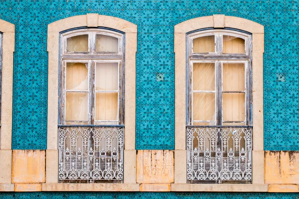 Traditional windows of vintage portuguese buildings