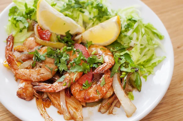 King prawns dish with salad