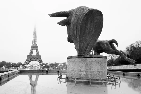 Sculptures on Trocadero and Eiffel Tower in Paris.