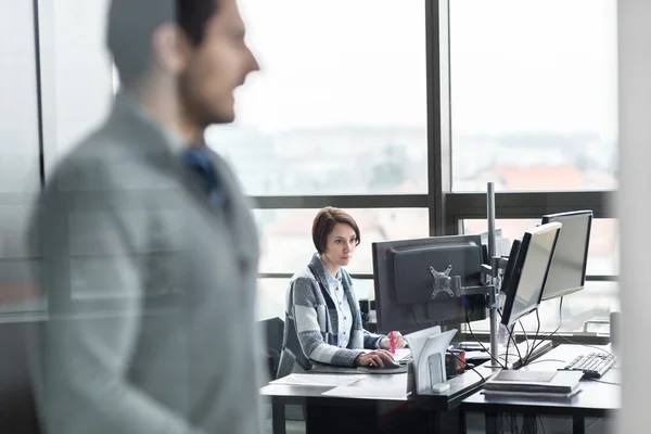 Personal assistant working in corporate office.