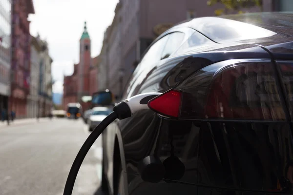 Electric Car in Charging Station.