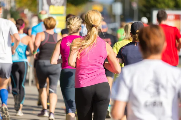 Group of people running.