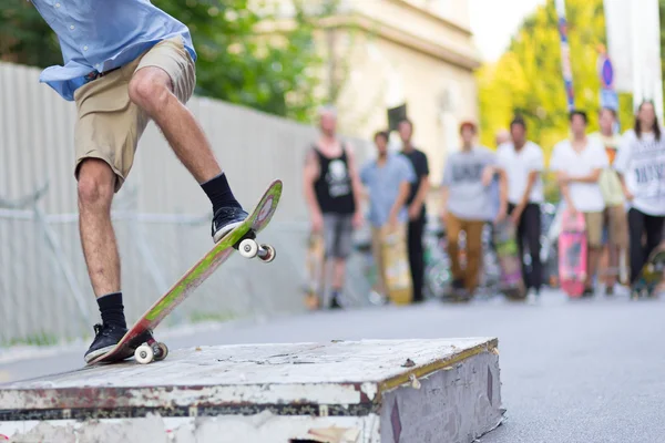 Boys skateboarding on street. Urban life.