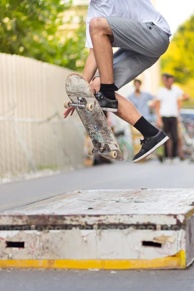 Boys skateboarding on street. Urban life.
