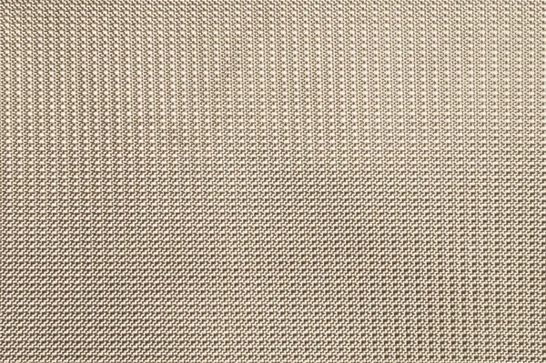 Beige background from artificial material