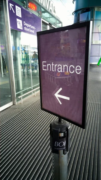 Entrance sign at transport station doors