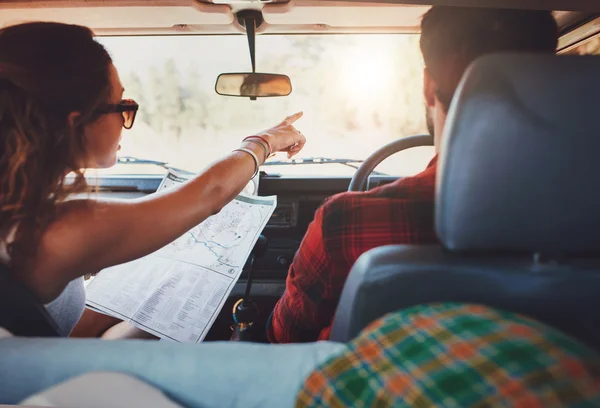 Couple on a road trip taking detour