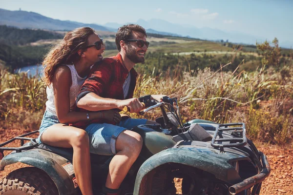 Couple having fun on an off road adventure