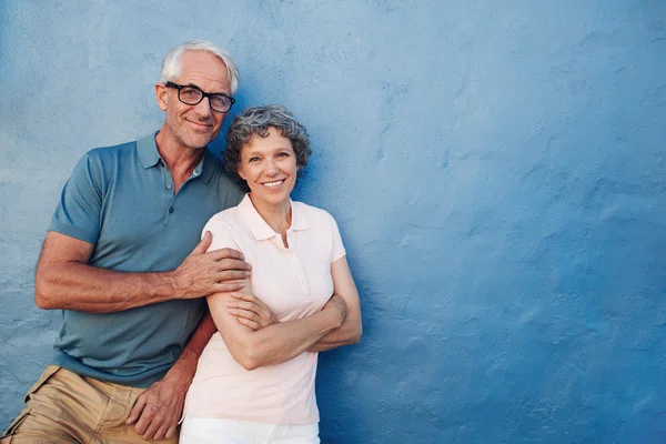 Happy senior man and woman together