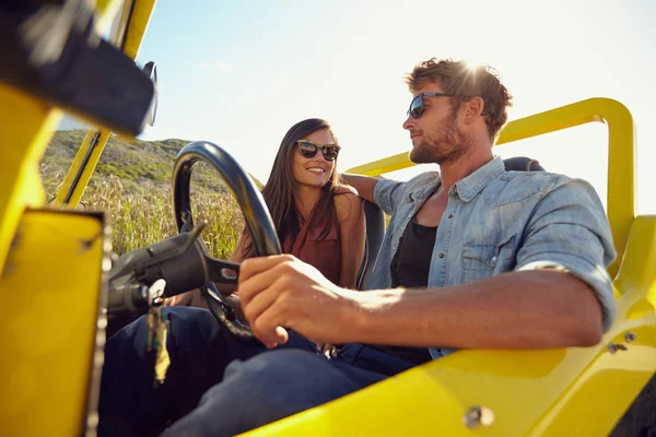 Relaxed young couple on a road trip