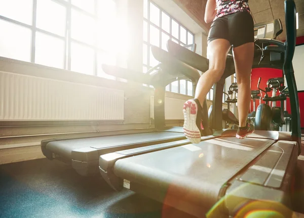 Woman running on treadmill