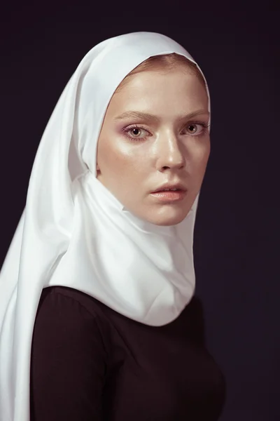 Young Religious Woman In A White Shawl