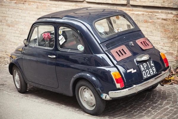 Old Fiat Nuova 500 city car, rear view