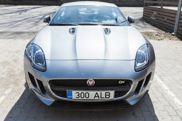 Gray metallic Jaguar F-Type coupe, frontal view