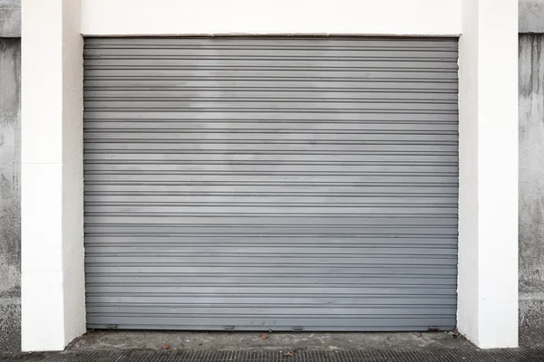 Gray metal garage gate, background photo texture