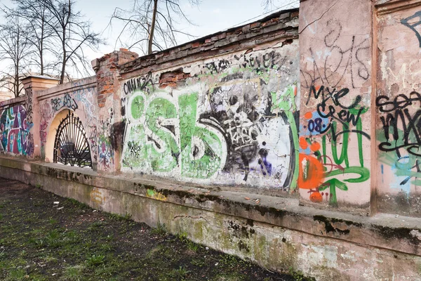 Street art, old urban walls with grungy graffiti
