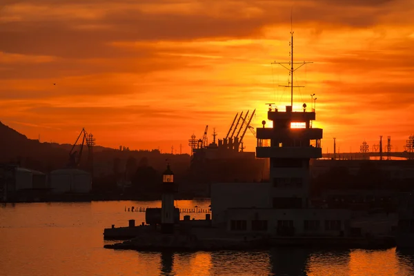 Silhouettes of cranes and buildings in Varna port