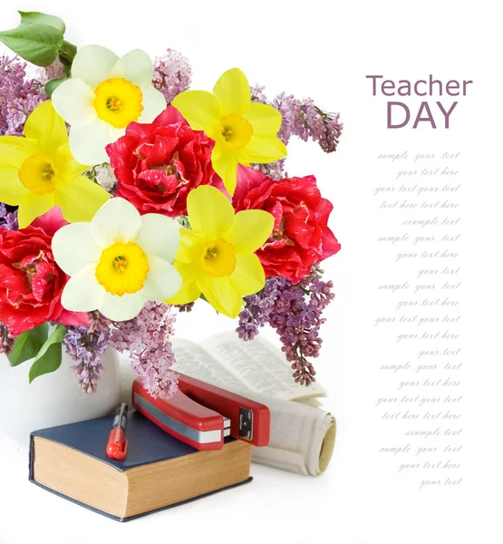 World teacher's day (still life with bunch of flowers and books isolated on white background with sample text)