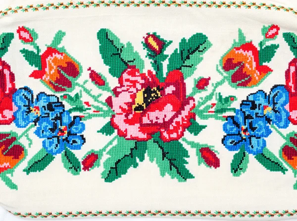 Embroidered good by cross-stitch pattern