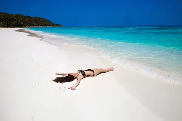 Free Happy Woman Enjoying tropical beach nature. Wellness. Trave