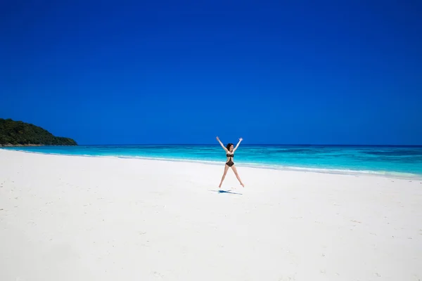 Enjoyment. Seashore. Happy free woman Raising Hands or Open arms