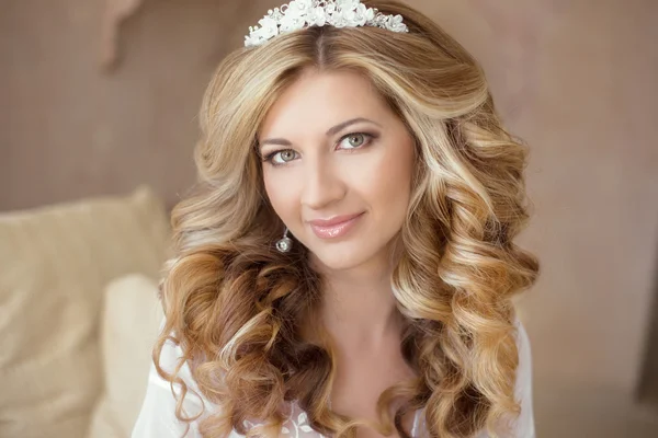 Healthy hair. Wedding makeup. Beautiful smiling girl bride with