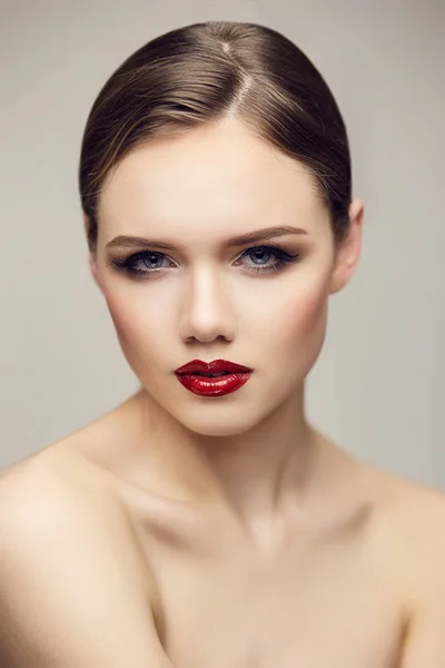 Serious red lips girl