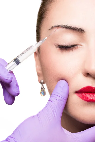 Woman gets cosmetic injection beauty treatment