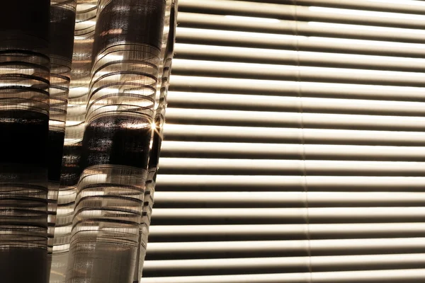 Venetian blinds with curtains background, view window