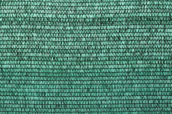 Abstract plastic net texture for green background