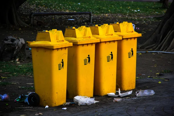 Yellow garbage bins