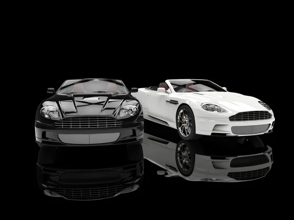 Black and white luxury sports cars - reflection