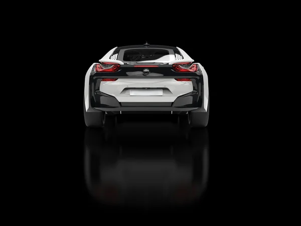 Modern white sports car - isolated on black reflective background