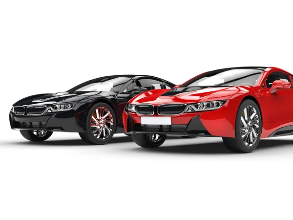 Black and red sports cars - side to side