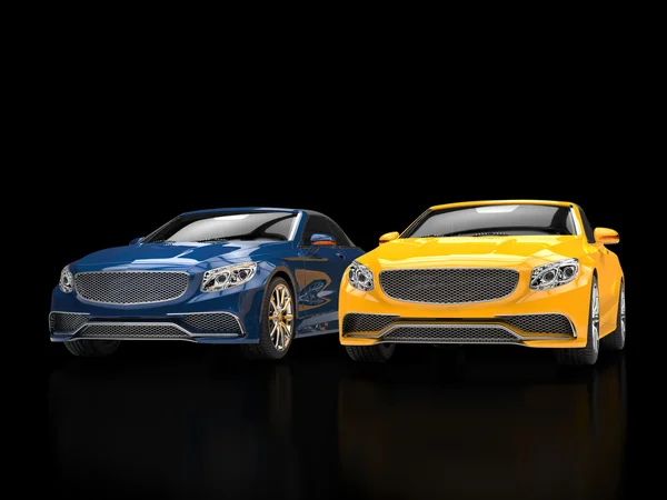 Blue and yellow modern cars on black reflective background