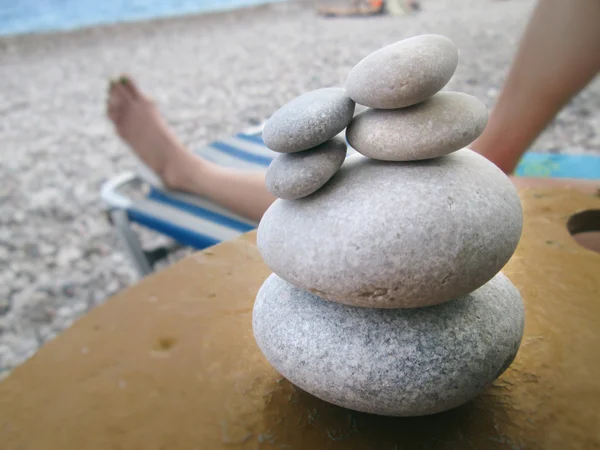 Small stacked rocks on the beach